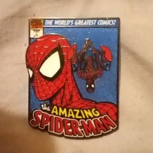 A marvel/disney pin of "The Amazing Spider-Man: The World's Greatest Comics"
